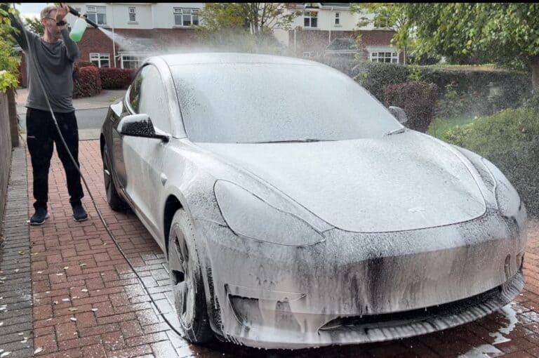 Black Car Washing With Pre-Wash Snow Foam